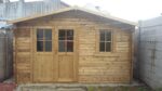 Abri de jardin 12m² PLUS en bois 40mm traité teinté marron Gardy Shelter